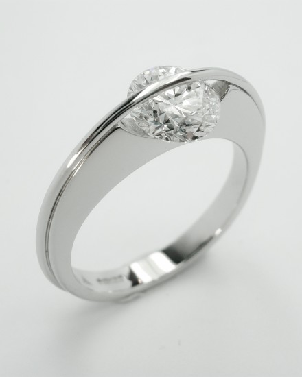 Platinum single stone 1.07ct. 'F' colour round brilliant cut diamond 'Lunar' style ring. Ideal diamond sizes from 0.50ct. to 1.25ct.