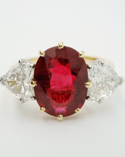 2.38ct super fine, pigeon blood red, oval Ruby with a pair of 0.75ct 'D' colour heart shaped diamonds. Ideal ruby size 1.00ct to 3.00ct Heart diamonds in proportion to ruby.