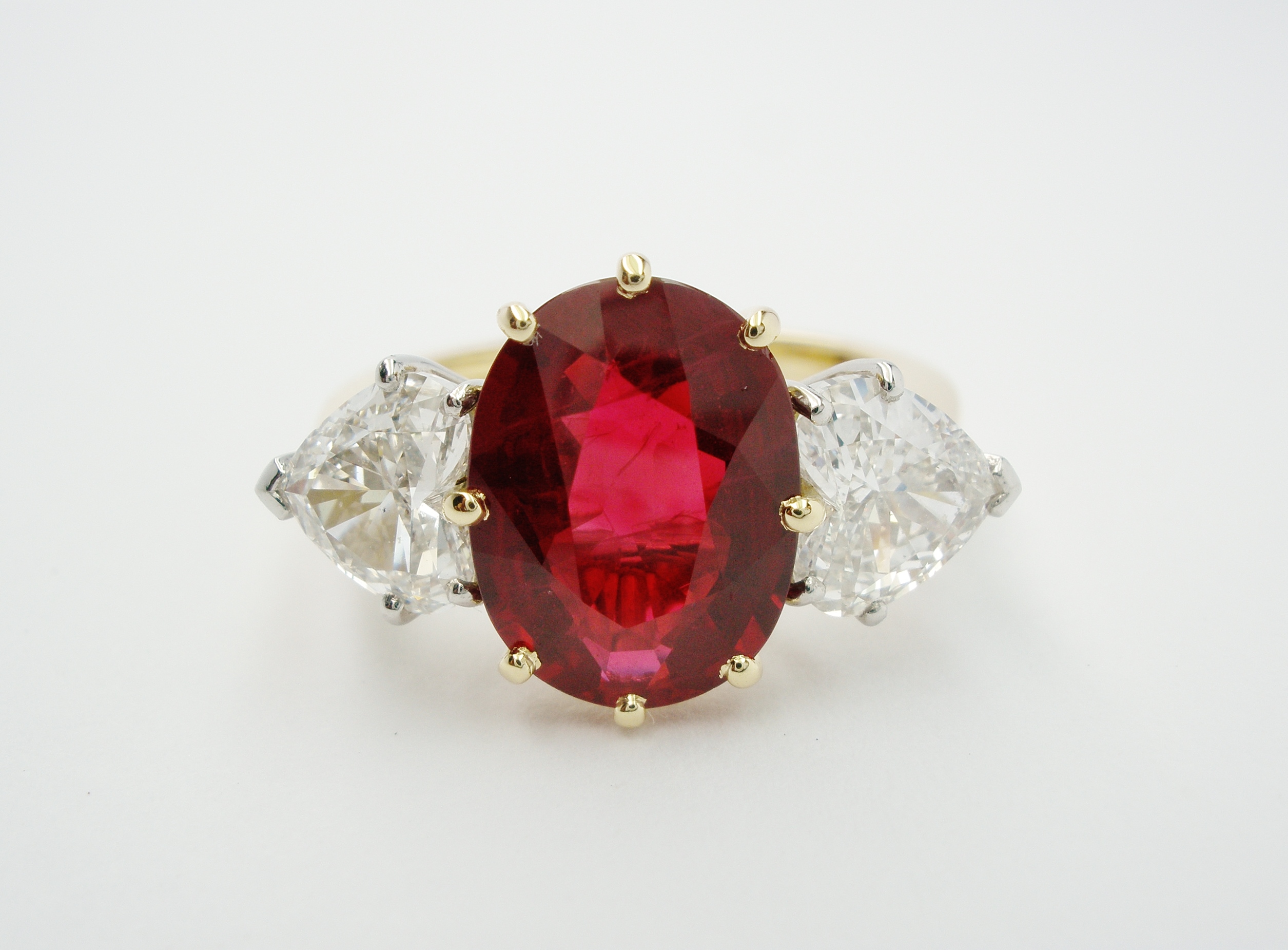 2.38ct super fine, pigeon blood red, oval Ruby with a pair of 0.75ct 'D' colour heart shaped diamonds. Ideal ruby size 1.00ct to 3.00ct Heart diamonds in proportion to ruby.