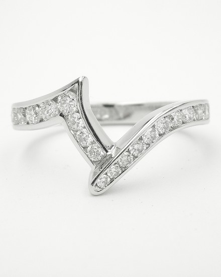 Platinum zig-zag wedding ring shaped to fit around a single stone marquise cross-over engagement ring and channel set with round brilliant cut diamonds to 55% cover.