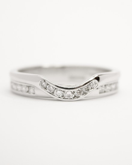 'Collar style' diamond set platinum wedding ring shaped to fit with a single stone straight diamond engagement ring.