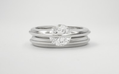 Platinum wedding ring with applied raised wire to match single stone 'Lunar' engagement ring.