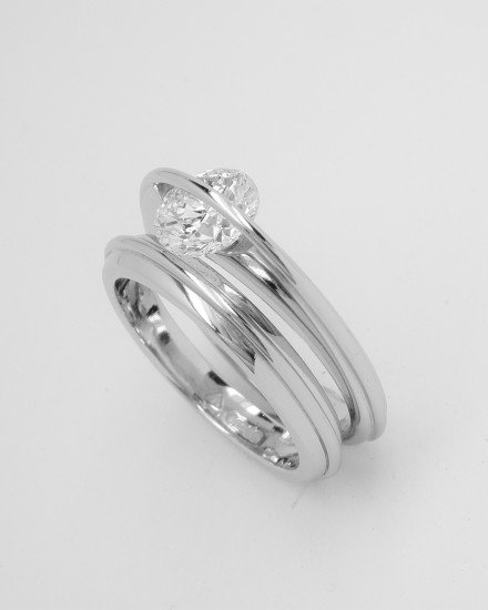 Platinum wedding ring with applied raised wire to match single stone 'Lunar' engagement ring.