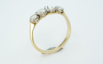 Worn 4 stone diamond ring to have diamond replaced and remounted in a similar style.