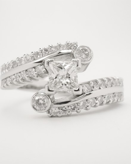 My palladium remodel of princess & brilliant cut diamond ring styled slightly different to make diamonds more secure.