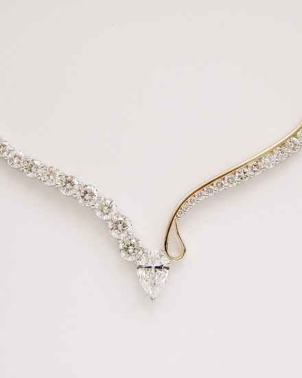 Bespoke Single Pear shaped diamond & 27 stone round brilliant cut diamond necklace mounted in platinum & 18ct.yellow gold with individually hand crafted links.