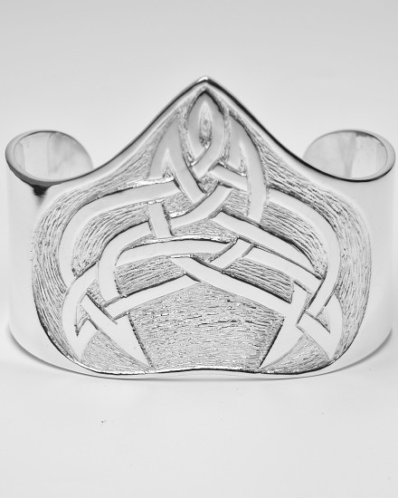 Sterling silver broad cuff torque bangle hand carved with an original Celtic designed pattern.
