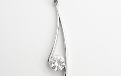 Single stone round brilliant cut diamond curvedwishbone style palladium pendant_.