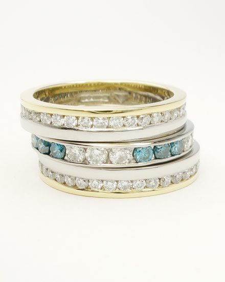 Triple stacking half eternity style white and blue diamond rings mounted in platinum & 18ct. yellow gold.