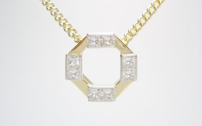 18ct. yellow gold & platinum octagonal pendant set with 8 princess cut diamonds.