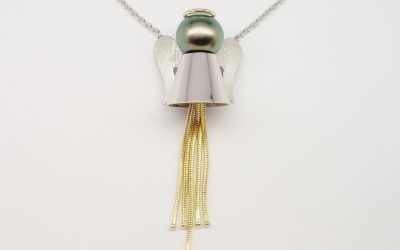 Black Tahitian pearl 'Angel' pendant mounted in palladium and 18ct. yellow gold.