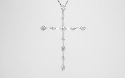 18ct. white gold diamond cross. The 11 diamonds weigh a total of 0.43cts. Original £1,260 was £760 now £570