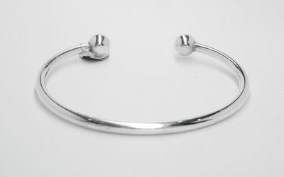 Sterling silver solid torque bangle with ball ends. Original £148 was £90 now £65