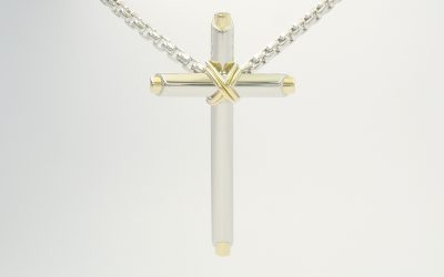 Platinum and 18ct. yellow gold tubular cross with fine 18ct. yellow gold binding wire.