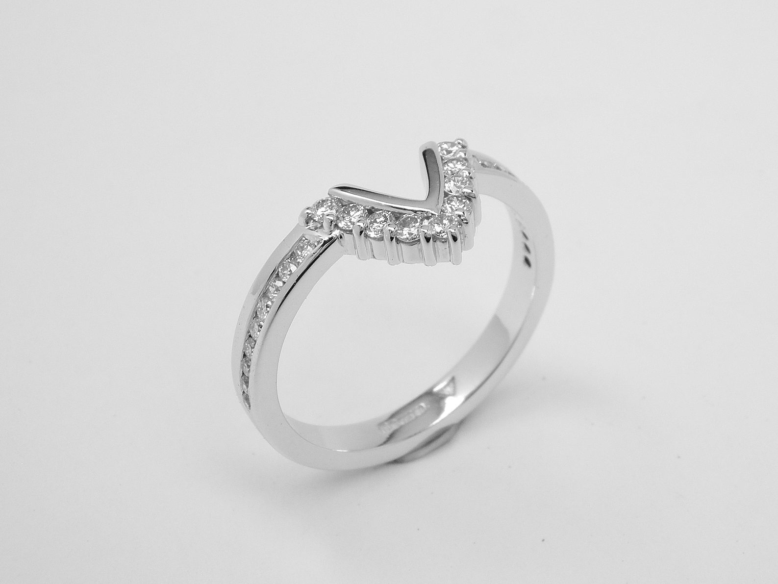 9 stone round brilliant cut diamond part channel set platinum wedding - eternity ring with channel set diamond shoulders shaped to fit around marquise diamond ring.