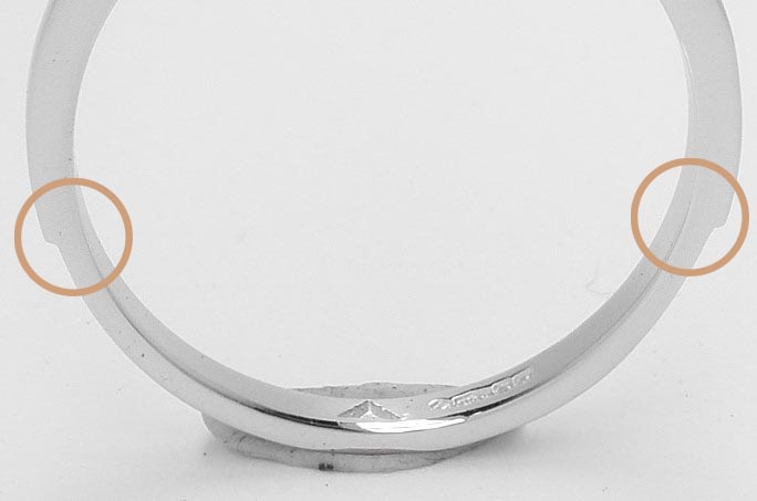 Images showing the back of the shank of the engagement ring after being filed thinner and the ‘lips’ on either side (circled), which locates with the edge of the back plate.