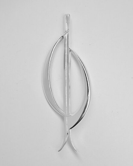 A sterling silver kilt pin depicting stylised initials C, J, B, a pair of skis and loosely a rugby ball.