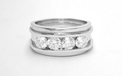 A 4 stone round brilliant cut diamond ring mounted in platinum