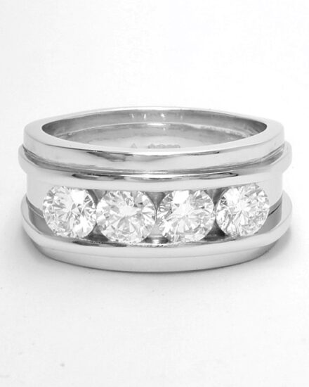 A 4 stone round brilliant cut diamond ring mounted in platinum