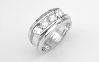 A 4 stone round brilliant cut diamond ring mounted in platinum