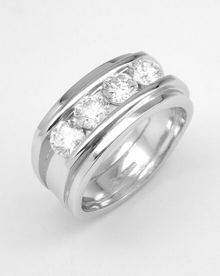 A 4 stone round brilliant cut diamond ring mounted in platinum