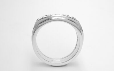 A 4 stone round brilliant cut diamond ring mounted in platinum