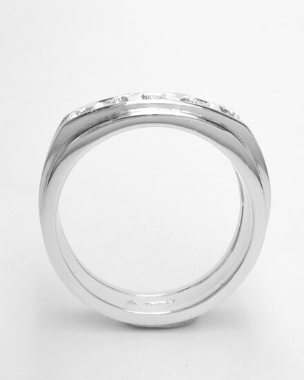 A 4 stone round brilliant cut diamond ring mounted in platinum