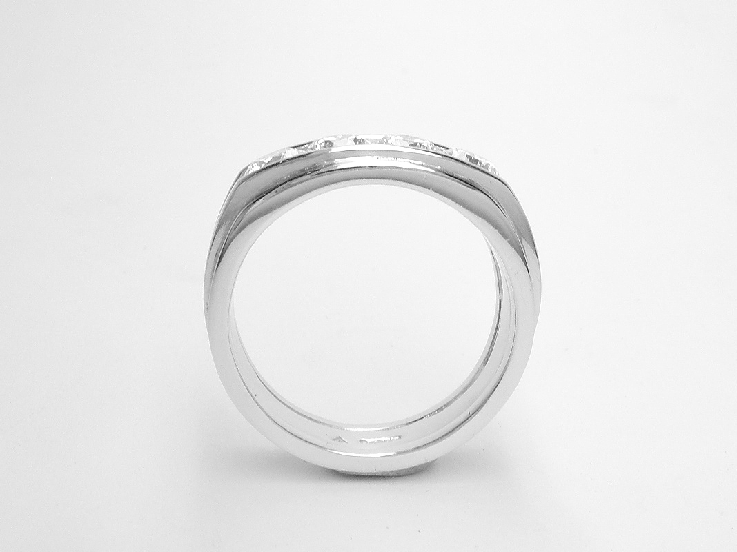 A 4 stone round brilliant cut diamond ring mounted in platinum